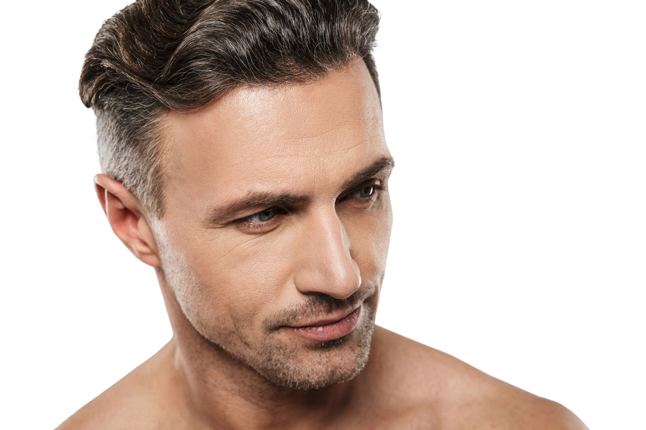 Man looking to the right with smooth features